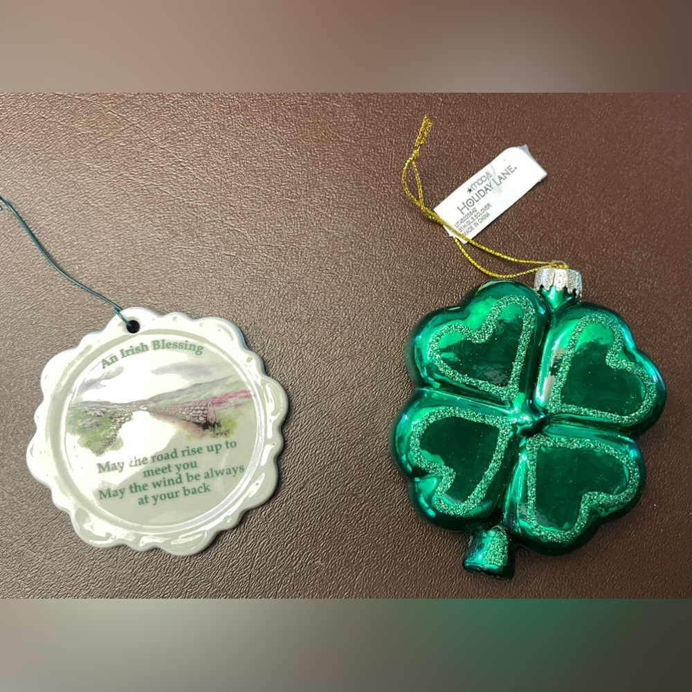 Two Irish ornaments, glass shamrock and porcelain Irish blessing.